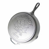 12 Inch Cast Iron Skillet with Maple Leaf Scene and Hot Handle Holder by Lodge
